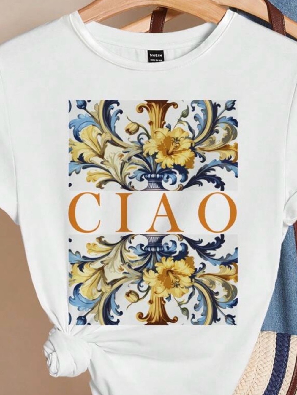 SHEIN White Floral Scroll 'CIAO' Graphic Tee with Blue and Yellow Accents